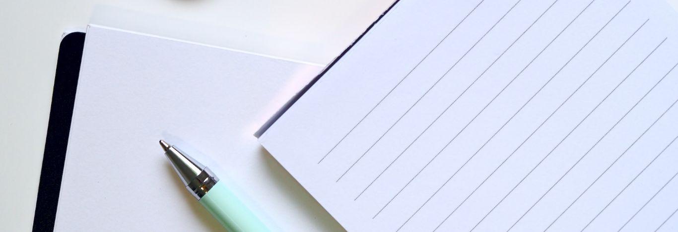 caderno e caneta para ilustrar texto sobre como corrigir erro na prova do Enem
